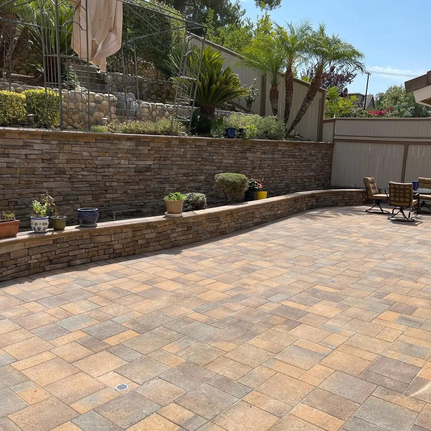 A finished paver driveway by Pacific Pavers in Orange County