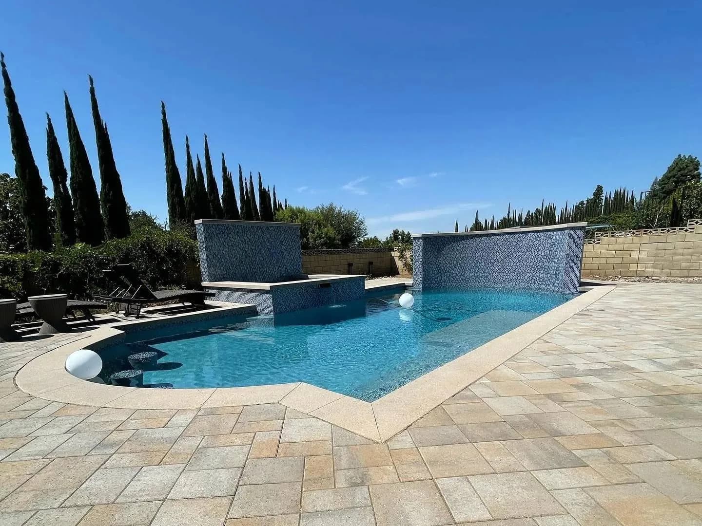 Custom paver patio, walkway, and pool deck installation in Orange County by Pacific Pavers
